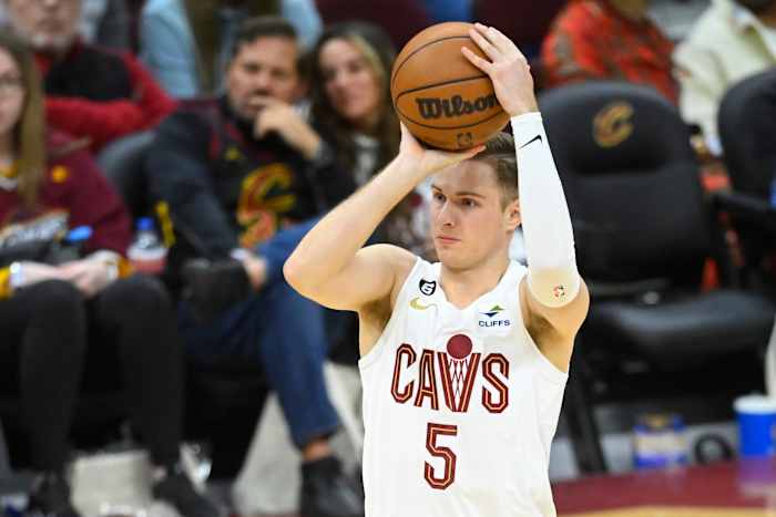 Apr 9, 2023; Cleveland, Ohio, USA; Cleveland Cavaliers guard Sam Merrill (5) shoots in the third quarter against the Charlotte Hornets at Rocket Mortgage FieldHouse. Mandatory Credit: David Richard-USA TODAY Sports